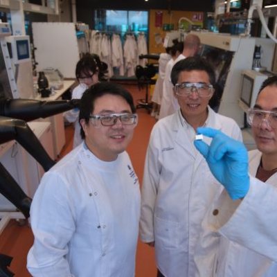 Examining the small but mighty solar cell technology set to revolutionise photovoltaics after another world-record efficiency breakthrough are (from left) Dr Peng Chen, Professor Lianzhou Wang and Dr Dongxu He.